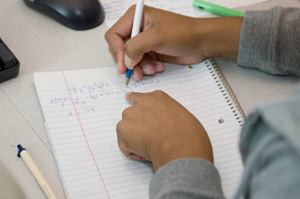 Student working equation Student working equation
